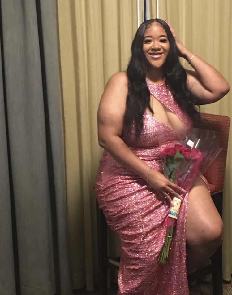 Rose-pink sequin evening gown with a high slit