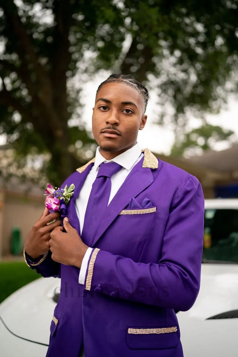 Custom purple suit with gold trim